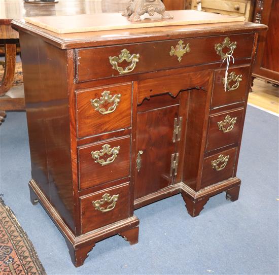 A George III mahogany kneehole desk W.80cm